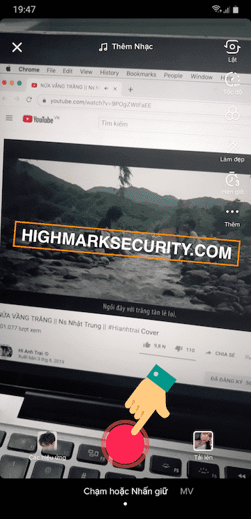 Nhấn nút đỏ hoặc chạm để quay